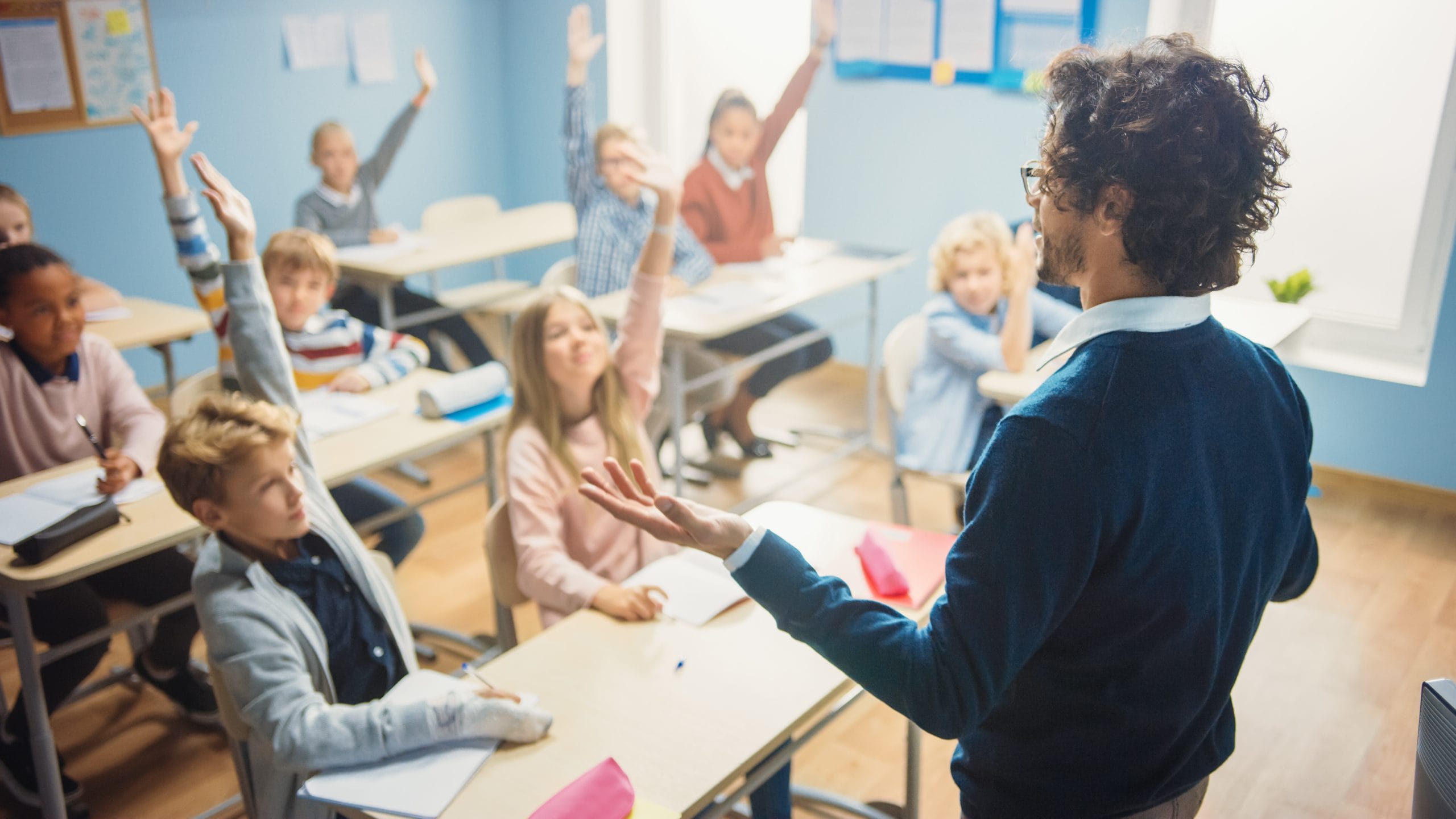 Teacher in front of engaged classroom